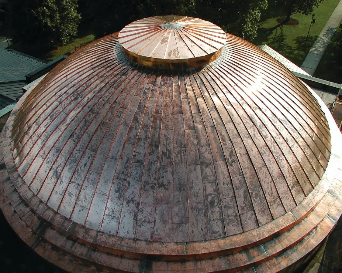 Craftsman Roofing crew installing a new roof in Somerville